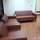 كنب جلد لون جملي و في كرسي انتظار جلد