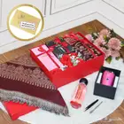 صندوق هدايا  يتم تقديم المجموعة في صندوق هدايا أحمر أنيق مع