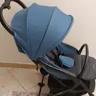عربية اطفال مع كرسي اطفال مخصص للسيارة