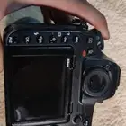كاميرا نيكون D850 مع عدسة تامرون 70-300مم بمانع اهتزاز
