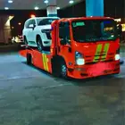 سطحه لنقل السيارات المصدومة والمعطلة