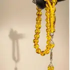 سبحة من حجر الكهرمان متوفر 10حبات