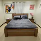 HomeBox Bed 180 x 200 with two side tables and a wardrobe