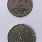 عملتان معدنيتان من عهد الملك فيصل