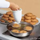 صانعة الدونات اليدويه 15حبه