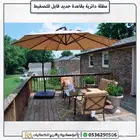 مظلة دائرية مع قاعدة تثبيت متينة