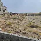 أرض مستوية عزاز مساحة900م بالقرب من حي الوسام خميس مشيط