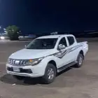 سياره مستوبيشي غمارتين L200 دبل ديزل قير عايدي نظيفه