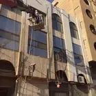 رش الرمل (تنظيف الدهان السابق)