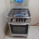 فرن غاز غسالة شبه جديد