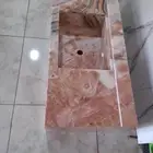 تفصيل وتصميم مغاسل ومطابخ وطاولات رخام صناعي وطبيعي