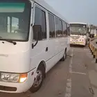 coster mitsubishi rosa for rent with driver monthly