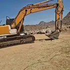 بوكلين للحفريات وقص الارض وبنيان الحجر