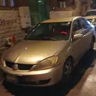 سياره ميتسوبيشي لانسر 2009 للبيع استماره جديد فحص جديد عداد3