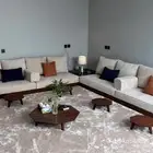 أعمل في مجال تفصيل وتصميم وبيع الكنبات والكراسي والستائر. أ