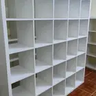دولاب ايكيا شبه جديده 5x5 عدد الرفوف في الواحد 25