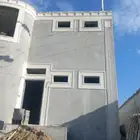 لياسه ملونه باللاسمنت الابيض وبطحاء الرياض