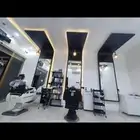 حلاق لتقبيل خلف محطة مشوط