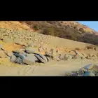 بكلين للقص الاراضي وبنيان حجر