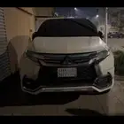 متسوبيشي سبورت 6سلندر دبل لون ابيض موديل 2019 مخزن ممشى قليل