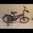 دراجة 4 عجلات لون زهر 12 انش