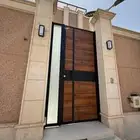 باب كلادينج باب المنيوم سواتر مظلات هناجر شبابيك المنيوم
