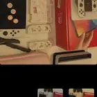 سويتش بشاشة OLED - بذراع تحكم جوي كون بلون أزرق نيون وأحمر