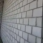 معلم بناء ولياسه