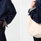 شنطة يد بتصميم عملي وعصري UNIQLO