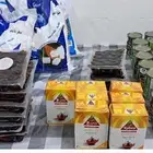 يوجد مجموعة من والسكر والمعلبات والمكرونه والتمور