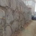 بنا حجر كبير و صغير مدرجات زراعيه ربراب تنظيف