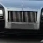 صدام وشمعات رولز رويس