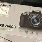 كاميرا كانون eos2000d للبيع استخدام نظيف مع كامل ملحقاتها