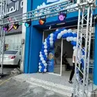 تنسيق افتتاح محلات كشافات متعددالوان  اقوس بالونات متعدد ال