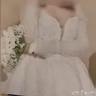 فستان زفاف ابيض مع الشرعه