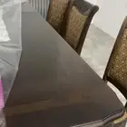 طاولة طعام مع ثمان كراسي