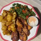 توزيع وجبات رز ودجاج صدقة