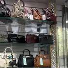 شنط بحجم وسط مختلف الأشكال ألوان شتويه