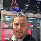 جزار الأضاحي بعيد لدي منشار كهرباء للدبح جميع انواع الأضاحي