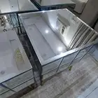 خمس طاولات زجاج