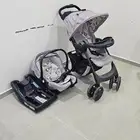 عربية اطفال مع كرسي سيارة