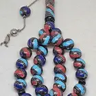 يسر طبيعي بحر أحمر بالفضة