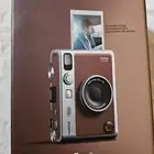 كاميرا انستاكس ميني ايفو من فوجي فيلم بلون بني