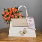 أناقة الورد البرتقالي مع فخامة حقيبة Laverne تنسيق يجمع