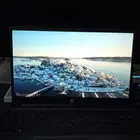 لابتوب HP Pavillion مع الكرتون