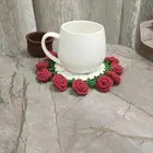 قاعدة كوب كروشية على شكل باقة ورد