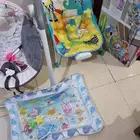 مستلزمات اطفال هزاز و كرسي و بساط مائي استعمال خفيف شبه جديد
