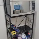 رفوف اسود حديد وخشب