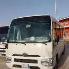 Coaster bus for rent with driver