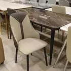 طاولات طعام رخام وخشب جلد وقماش